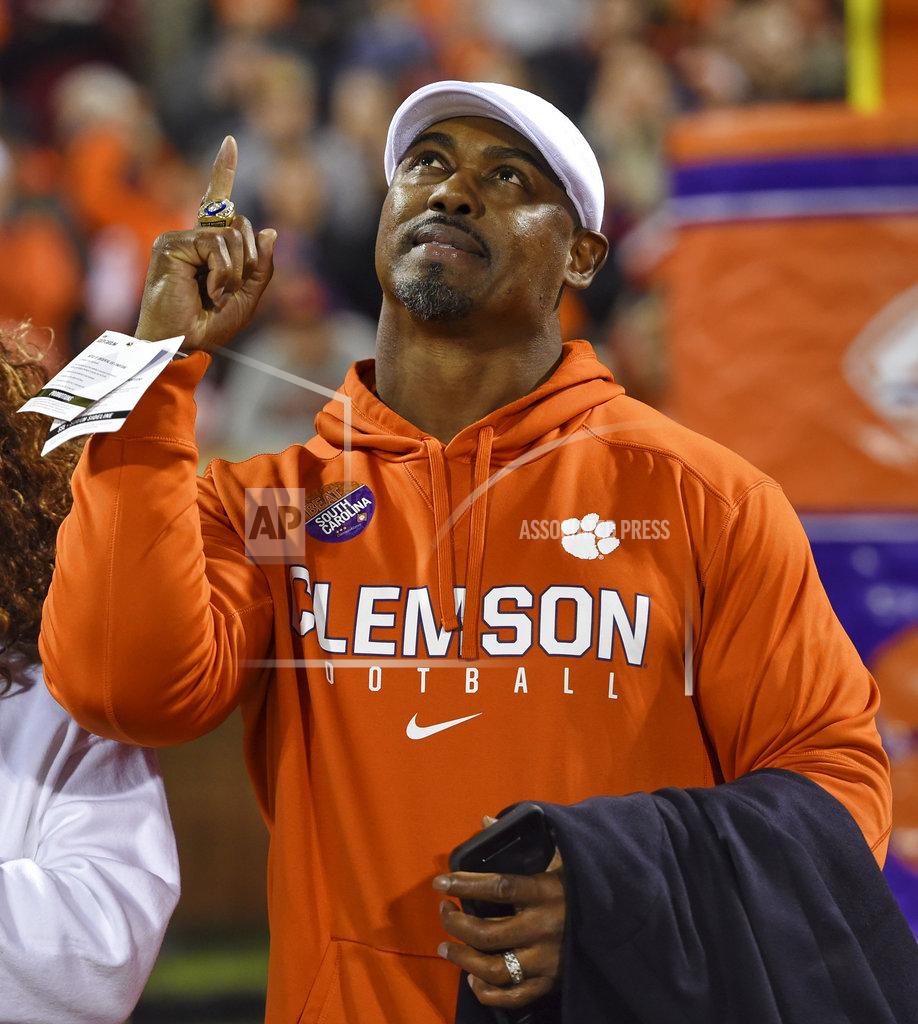 Richard Shiro Former Clemson and NFL player Brian Dawkins points upward while being honored for his induction into the NFL HOF during the first half of an NCAA college football game against South Carolina Saturday, Nov. 24, 2018, in Clemson, S.C. (AP Photo/Richard Shiro)