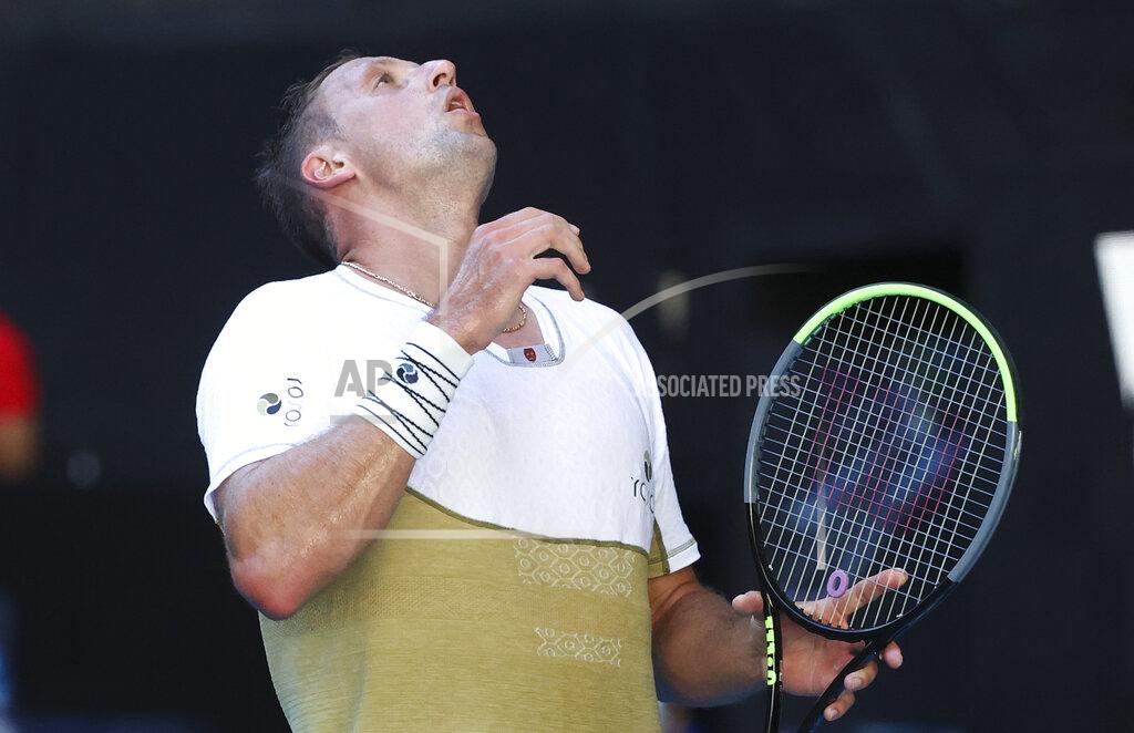 Hamish Blair United States' Tennys Sandgren reacts during his match against Australia's Alex De Minaur during their first round match at the Australian Open tennis championship in Melbourne, Australia, Tuesday, Feb. 9, 2021.(AP Photo/Hamish Blair)