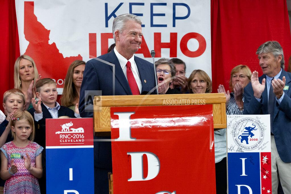 Kyle Green Idaho Gov. Brad Little is cheered by attendees and family after declaring victory in the gubernatorial primary during the Republican Party's primary election celebration Tuesday, May 17, 2022, at the Hilton Garden Inn hotel in Boise, Idaho. (AP Photo/Kyle Green)