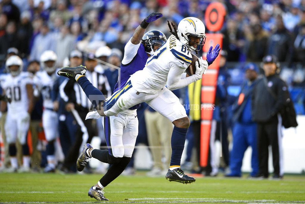 Nick Wass Los Angeles Chargers wide receiver Mike Williams (81) makes a catch for a first down in front of Baltimore Ravens cornerback Jimmy Smith in the second half of an NFL wild card playoff football game, Sunday, Jan. 6, 2019, in Baltimore. (AP Photo/Nick Wass)