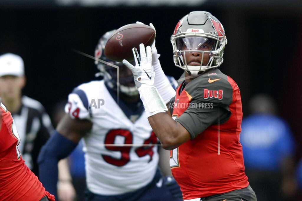 Jason Behnken FILE - In this Dec. 21, 2019, file photo, Tampa Bay Buccaneers quarterback Jameis Winston (3) throws a pass during the first half of an NFL football game against the Houston Texans in Tampa, Fla. Winston, Cam Newton and Jadeveon Clowney didn't have to wait long at all to find homes in the NFL when they came out of college. The three former No. 1 overall draft picks are finding things moving much more slowly as they search for new homes or contracts this offseason. (AP Photo/Jason Behnken, File)