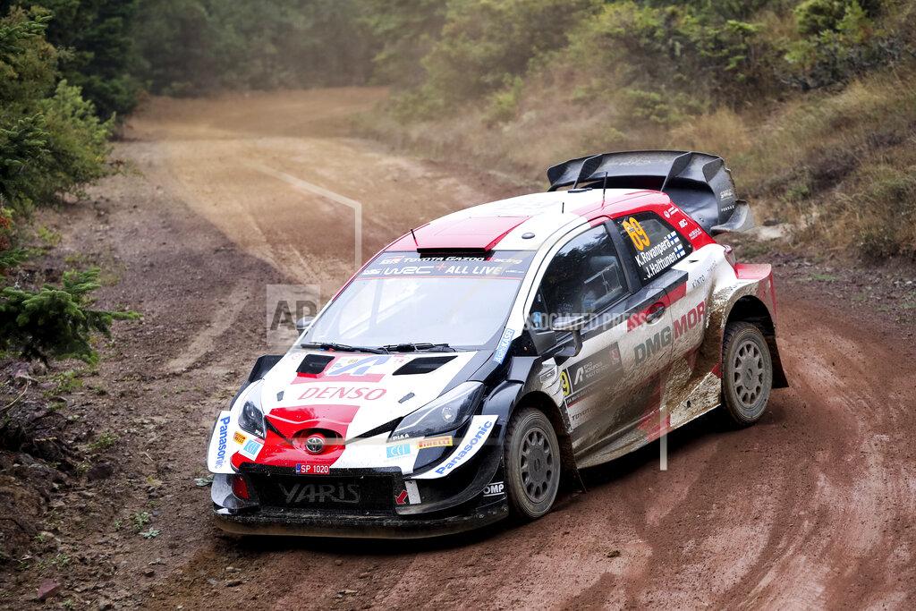 Klodian Lato Kalle Rovanpera and his co-driver Jonne Halttunen of Finland in their Toyota Yaris WRC car, compete in the WRC Acropolis Rally at the stage of Tarzan 2, northwest of Athens, Sunday, Sept. 12, 2021. The Finnish crew of Kalle Rovanpera and Jonne Halttunen has won the Acropolis Rally, after leading through most of the four-day World Rally Championship race. (Klodian Lato/Eurokinissi via AP)