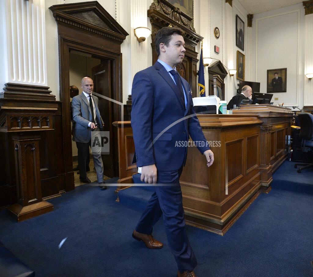 Sean Krajacic Kyle Rittenhouse, center, walks into the courtroom with attorney Corey Chirafisi for a motion hearing in Kenosha, Wis., on Friday, Sept. 17, 2021. (Sean Krajacic/The Kenosha News via AP)