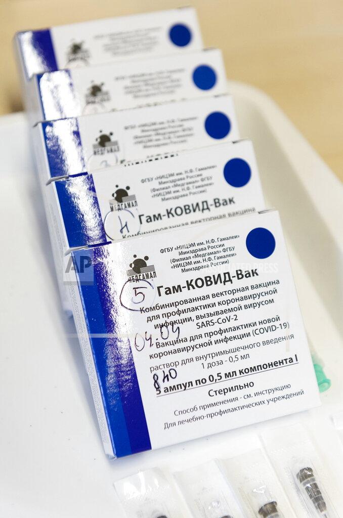 Attila Balazs Boxes of Sputnik V vaccines against coronavirus marked with exact dates of use in the Josa Andras Training Hospital in Nyiregyhaza, Hungary, Sunday, April 4, 2021, as the vaccination with Sputnik V against the new coronavirus continues in the country. (Attila Balazs/MTI via AP)