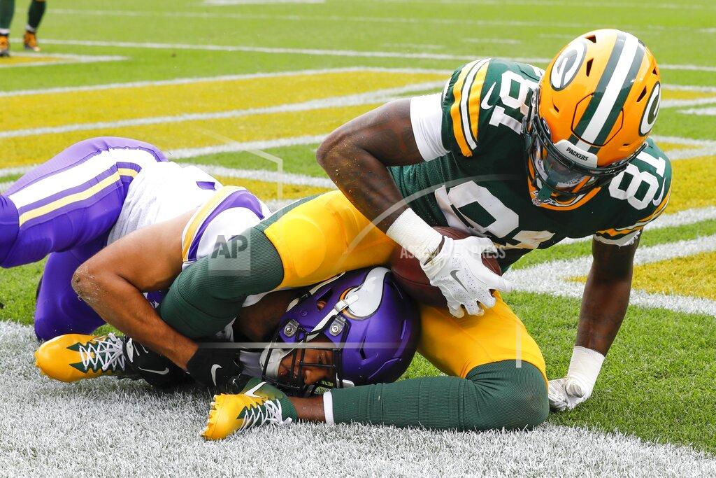 Mike Roemer Green Bay Packers' Geronimo Allison (81) catches a touchdown pass over Minnesota Vikings' Nate Meadors during the first half of an NFL football game Sunday, Sept. 15, 2019, in Green Bay, Wis. (AP Photo/Mike Roemer)