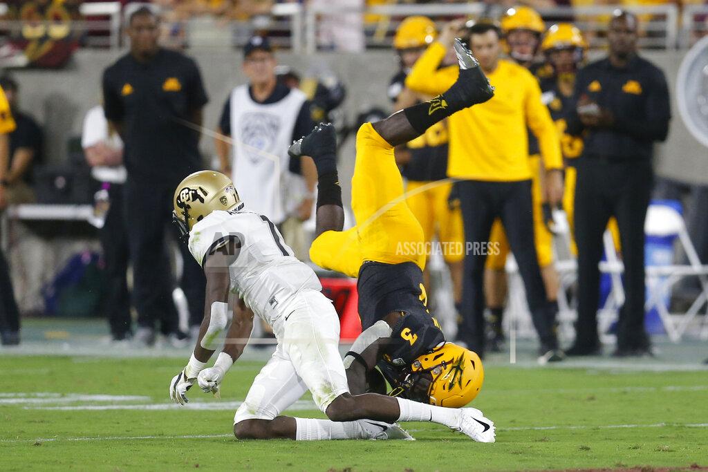 Rick Scuteri Colorado cornerback Delrick Abrams Jr. upends Arizona State running back Eno Benjamin (3) during the first half of an NCAA college football game Saturday, Sept. 21, 2019, in Tempe, Ariz. (AP Photo/Rick Scuteri)