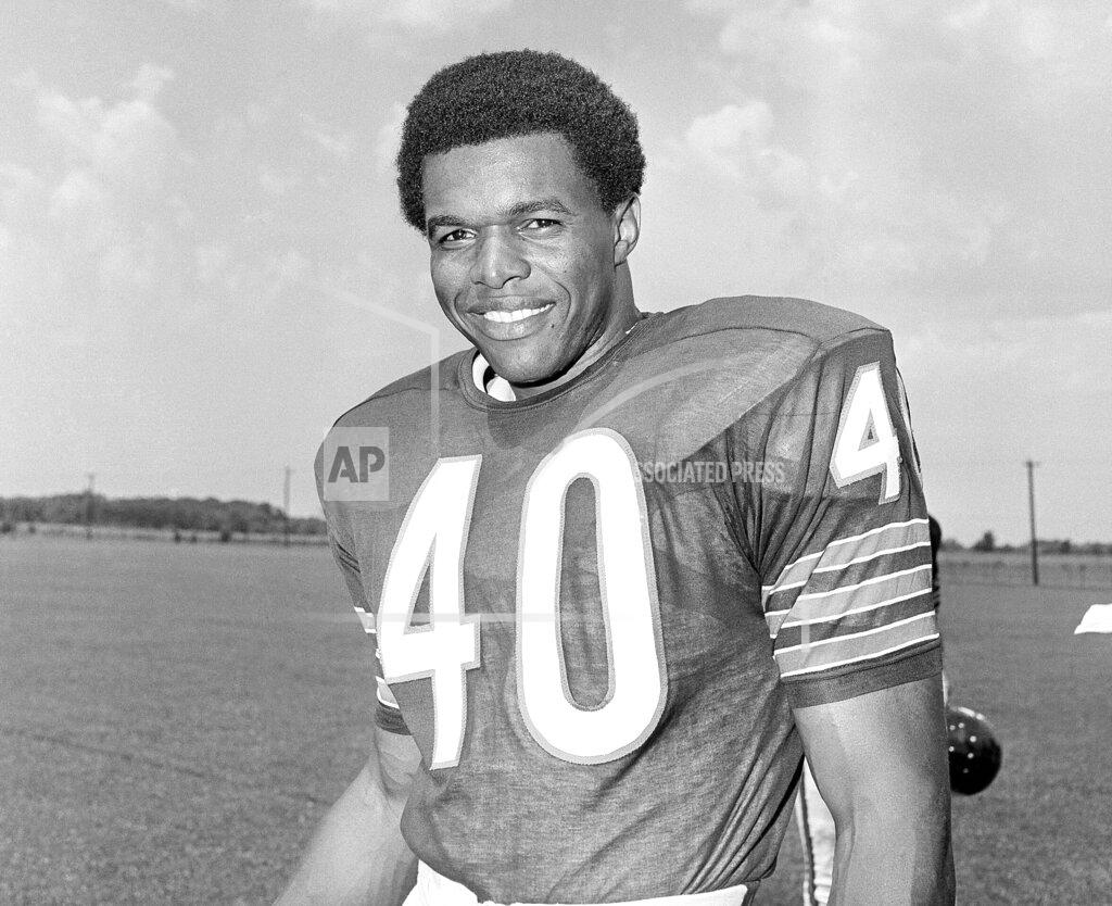 Uncredited FILE - This is a 1970 file photo showing Chicago Bears football player Gale Sayers. Hall of Famer Gale Sayers, who made his mark as one of the NFL’s best all-purpose running backs and was later celebrated for his enduring friendship with Chicago Bears teammate Brian Piccolo, has died. He was 77. Nicknamed “The Kansas Comet” and considered among the best open-field runners the game has ever seen, Sayers died Wednesday, Sept. 23, 2020, according to the Pro Football Hall of Fame. (AP Photo/File)