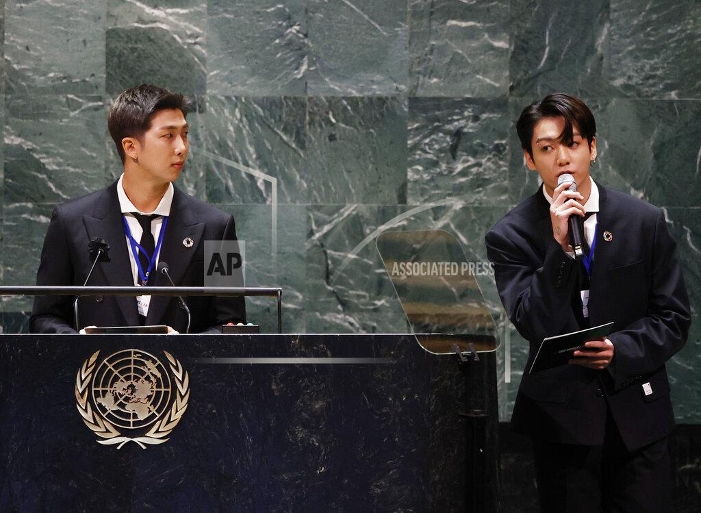 John Angelillo ADDS IDS - Members of South Korean K-pop band BTS, RM, left, and Jung Kook appear at the Sustainable Development Goals meeting during the 76th session of the United Nations General Assembly, at the United Nations Headquarters on Monday, Sept. 20, 2021. (John Angelillo/Pool via AP)