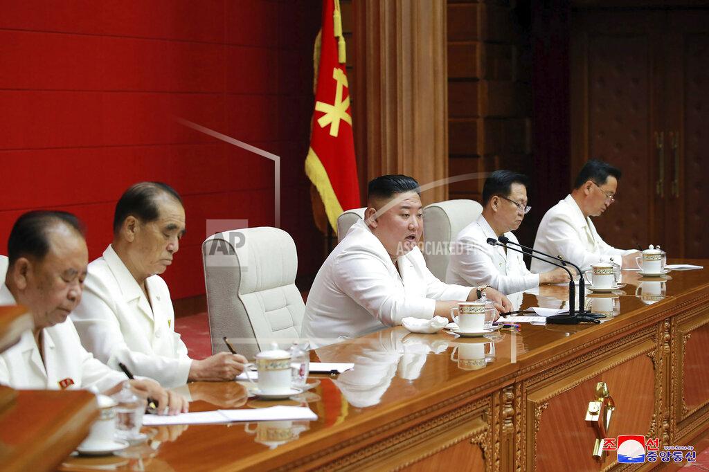 In this photo provided by the North Korean government, North Korean leader Kim Jong Un, center, attends a plenary meeting of the Workers’ Party in Pyongyang, North Korea, Wednesday, Aug. 19, 2020. North Korea has decided to hold a rare ruling party congress in January where leader Kim will announce a new five-year plan to develop the country’s dismal economy ravaged by U.S.-led sanctions and a global pandemic, state media said Thursday, Aug. 20, 2020. Independent journalists were not given access to cover the event depicted in this image distributed by the North Korean government. The content of this image is as provided and cannot be independently verified. Korean language watermark on image as provided by source reads: "KCNA" which is the abbreviation for Korean Central News Agency. (Korean Central News Agency/Korea News Service via AP)