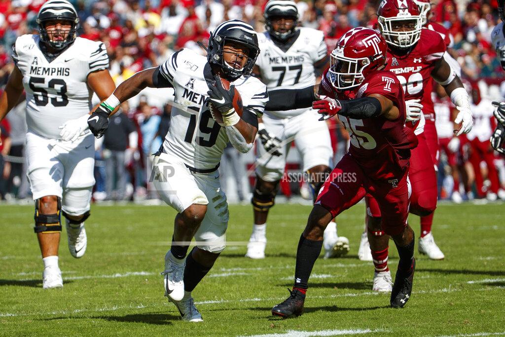 Chris Szagola Memphis running back Kenneth Gainwell (19) runs for a touchdown as Temple safety Amir Tyler (25) reaches for him during an NCAA college football, Saturday, Oct. 12, 2019, in Philadelphia. (AP Photo/Chris Szagola)