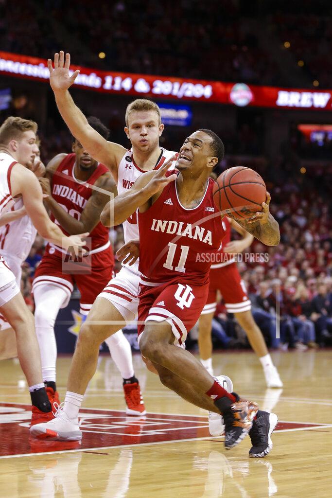 Andy Manis Indiana's Devonte Green (11) drives against Wisconsin's Brad Davison (34) during the first half of an NCAA college basketball game Saturday, Dec. 7, 2019, in Madison, Wis. (AP Photo/Andy Manis)