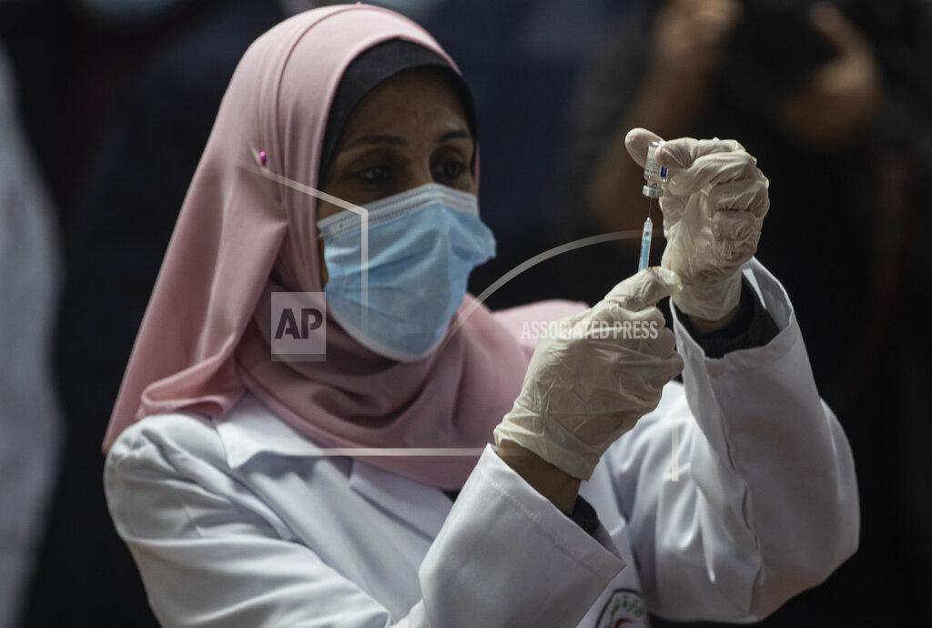 Khalil Hamra A Palestinian medic prepares a shot of the Russian-made Sputnik V coronavirus vaccine, in Gaza City, Monday, Feb. 22, 2021. (AP Photo/Khalil Hamra)