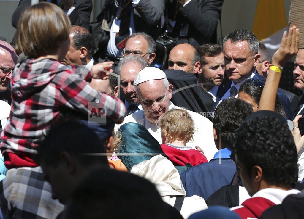Petros Giannakouris FILE - In this Saturday, April 16, 2016 file photo, Pope Francis meets migrants at the Moria refugee camp on the Greek island of Lesbos. Five years on, the deal between European Union and Turkey is no longer working but at a summit next week EU leaders will discuss ways to improve relations with Turkey and could try to revive the agreement. (AP Photo/Petros Giannakouris, File)