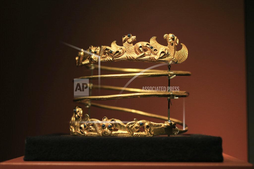 Peter Dejong FILE - In this Friday April 4, 2014 file photo, a spiraling torque from the second century A.D., is displayed as part of the exhibit called The Crimea - Gold and Secrets of the Black Sea, at Allard Pierson historical museum in Amsterdam. A Dutch appeals court rules Tuesday Oct. 26, 2021, on ownership of a trove of Crimean historical artifacts that were loaned to an Amsterdam museum shortly before Russia annexed the region. A lower court ruled in 2016 that the treasures should be handed to the Ukrainian government. (AP Photo/Peter Dejong, file)