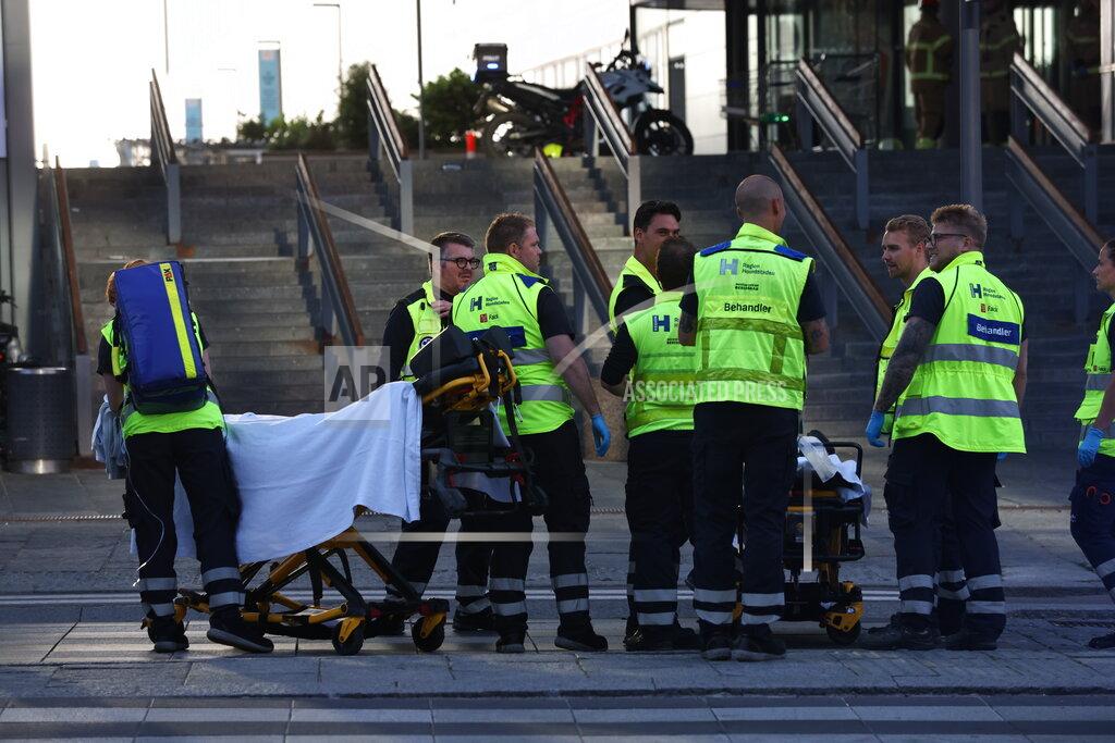 Olafur Steinar Gestsson Emergency services at the Field's shopping center after a shooting, in Copenhagen, Denmark, Sunday, July 3, 2022. Danish police say several people have been shot at a Copenhagen shopping mall. Copenhagen police said that one person has been arrested in connection with the shooting at the Field’s shopping mall on Sunday. Police tweeted that “several people have been hit” but gave no other details. (Olafur Steinar Gestsson/Ritzau Scanpix via AP)