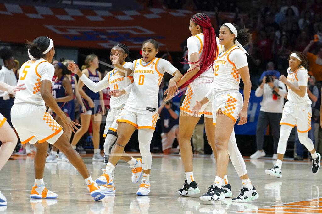 Mark Humphrey Tennessee players celebrate after beating Belmont 70-67 in a women's college basketball game in the second round of the NCAA tournament Monday, March 21, 2022, in Knoxville, Tenn. (AP Photo/Mark Humphrey)