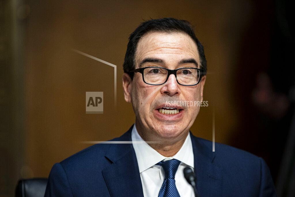Al Drago Treasury Secretary Steven Mnuchin speaks during a Senate Banking Committee hearing on Capitol Hill, on Tuesday, Dec. 1, 2020, in Washington. (Al Drago/The New York Times via AP, Pool)