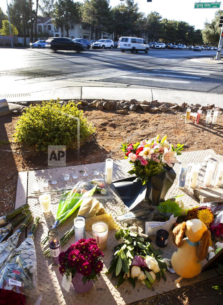 Bizuayehu Tesfaye A makeshift memorial to honor Tina Tintor, 23, is seen at South Rainbow Boulevard and Spring Valley Parkway, on Thursday, Nov. 4, 2021, in Las Vegas. Tintor and her dog were killed when former Raiders wide receiver Henry Ruggs, accused of DUI, slammed into the rear of Tintor's vehicle. (Bizuayehu Tesfaye/Las Vegas Review-Journal)