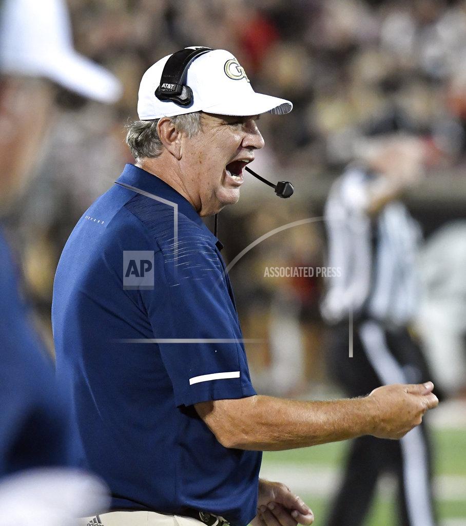Timothy D. Easley Georgia Tech head coach Paul Johnson shouts instructions to his team during the first half of an NCAA college football game against Louisville, Friday, Oct. 5, 2018, in Louisville, Ky. (AP Photo/Timothy D. Easley)