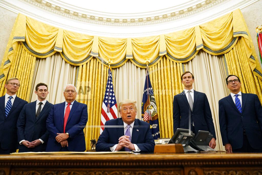 Andrew Harnik President Donald Trump speaks in the Oval Office at the White House, Thursday, Aug. 13, 2020, in Washington. Trump said on Thursday that the United Arab Emirates and Israel have agreed to establish full diplomatic ties as part of a deal to halt the annexation of occupied land sought by the Palestinians for their future state. (AP Photo/Andrew Harnik)