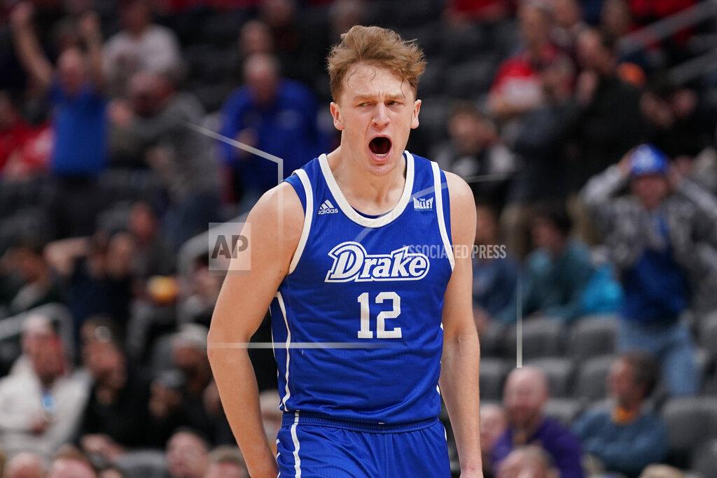 Jeff Roberson Drake's Tucker Devries celebrates after making a 3-point basket during overtime of an NCAA college basketball game against Missouri State in the semifinal round of the Missouri Valley Conference tournament Saturday, March 5, 2022, in St. Louis. Drake won 79-78. (AP Photo/Jeff Roberson)