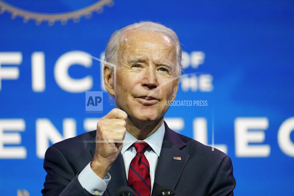 Susan Walsh President-elect Joe Biden speaks during an event at The Queen theater in Wilmington, Del., Tuesday, Dec. 8, 2020, to announce his health care team. (AP Photo/Susan Walsh)