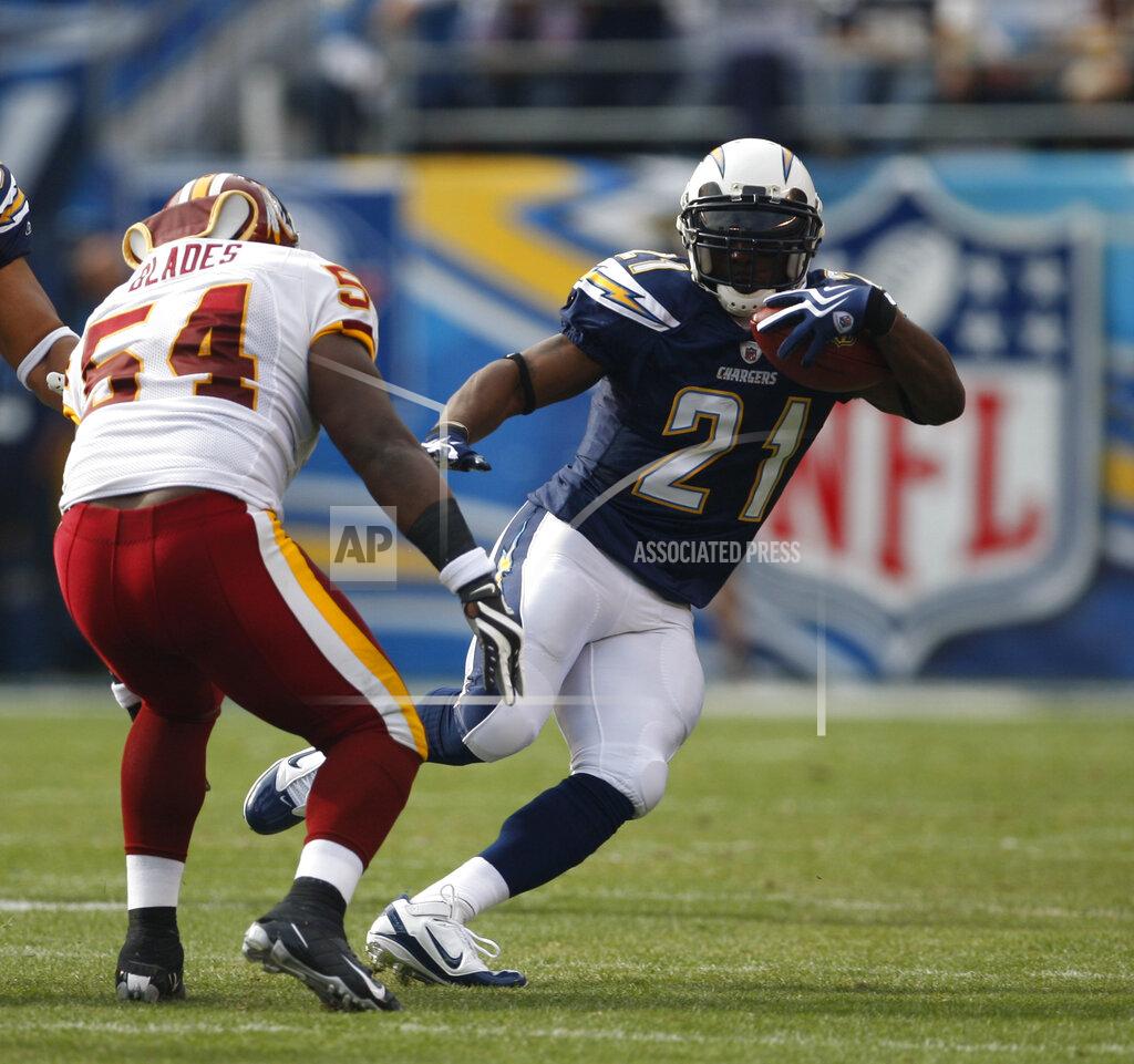 Lenny Ignelzi FILE - In this Sunday, Jan. 3, 2010 file photo, San Diego Chargers running back LaDainian Tomlinson during the first quarter of an NFL football game in San Diego. After shutting down receivers during his Hall of Fame career, Aeneas Williams, the former Cardinals and Rams defensive back, hosts the NFL Legends podcast, a platform for former players to share their stories, encourage each other and learn about programs available to them. Tomlinson was a guest on the podcast last month. He talked to Williams about his charity foundation and his commitment to social justice issues. (AP Photo/Lenny Ignelzi, File)