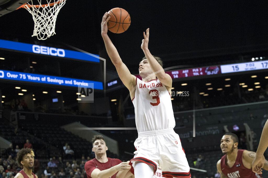 Mary Altaffer Davidson guard Jon Axel Gudmundsson (3) goes to the basket during the first half of an NCAA college basketball game against the Saint Joseph's in the Atlantic 10 Conference tournament, Friday, March 15, 2019, in New York. (AP Photo/Mary Altaffer)