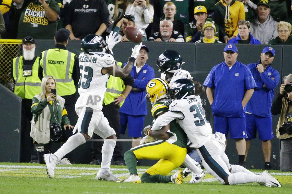 Mike Roemer Philadelphia Eagles outside linebacker Nigel Bradham (53) intercepts a last minute pass to secure the victory against Green Bay Packers during an NFL football game Thursday, Sept. 26, 2019, in Green Bay, Wis. Philadelphia won 34-27. (AP Photo/Mike Roemer)