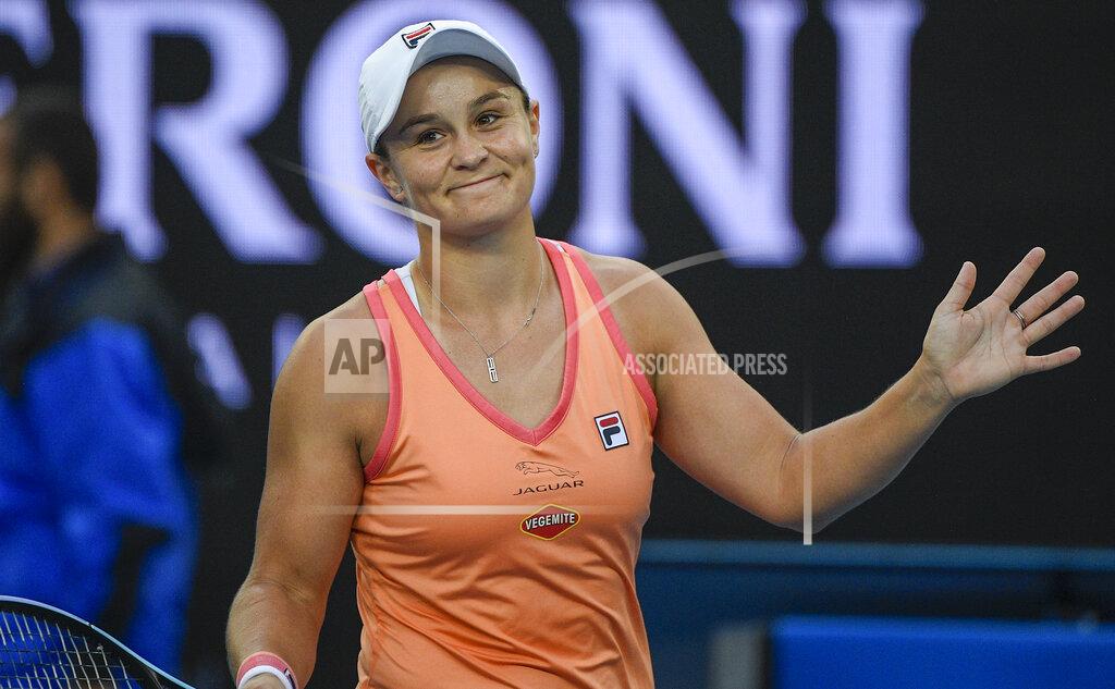 Australia's Ash Barty reacts after defeating Romania's Ana Bogdan in their match during a tuneup tournament ahead of the Australian Open tennis championships in Melbourne, Australia, Tuesday, Feb. 2, 2021. (AP Photo/Andrew Brownbill)