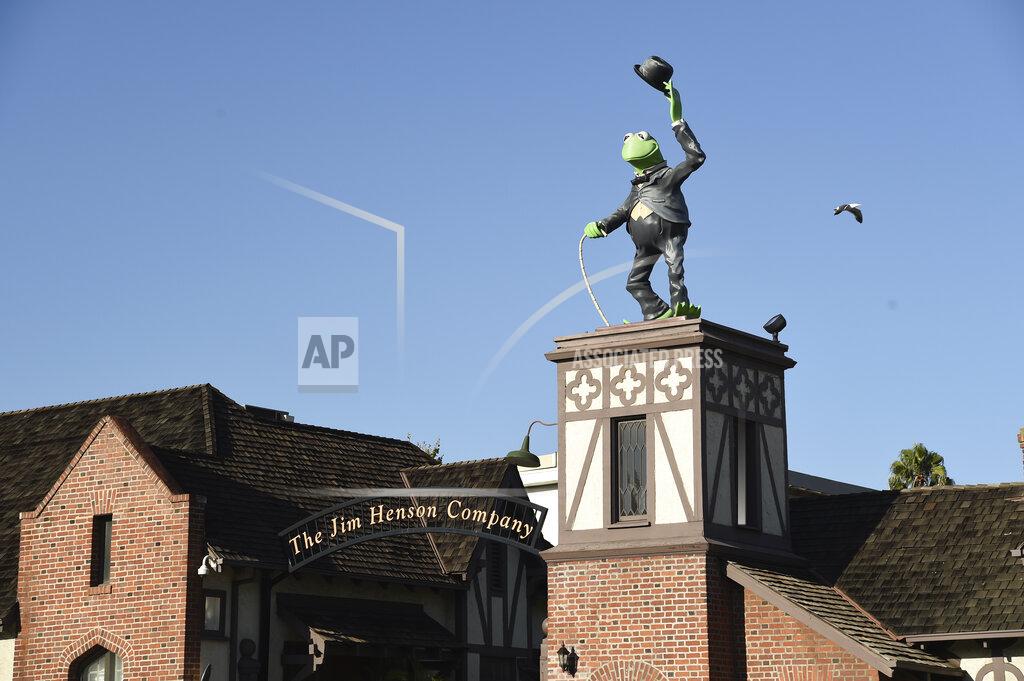 Chris Pizzello A statue of Kermit The Frog stands at the entrance to The Jim Henson Company, Tuesday, July 7, 2020, in the Hollywood section of Los Angeles. The U.S. government's small business lending program sent pandemic relief money into unexpected corners of the entertainment industry. The Muppet makers say they received about $2 million to keep their 75 workers employed through the coronavirus shutdown. (AP Photo/Chris Pizzello)