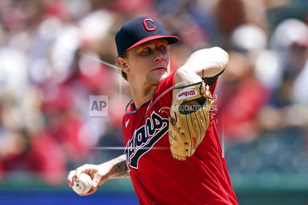 Tony Dejak Cleveland Indians starting pitcher Zach Plesac throws in the first inning of a baseball game against the St. Louis Cardinals, Wednesday, July 28, 2021, in Cleveland. (AP Photo/Tony Dejak)