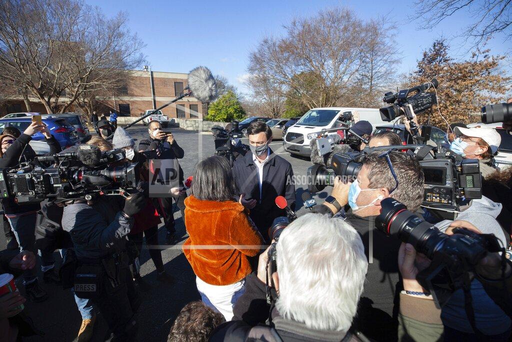 Branden Camp Democratic U.S. Senate challenger Jon Ossoff speaks to the media at Dunbar Neighborhood Center during Georgia's Senate runoff elections, Tuesday, Jan. 5, 2021, in Atlanta. (AP Photo/Branden Camp)