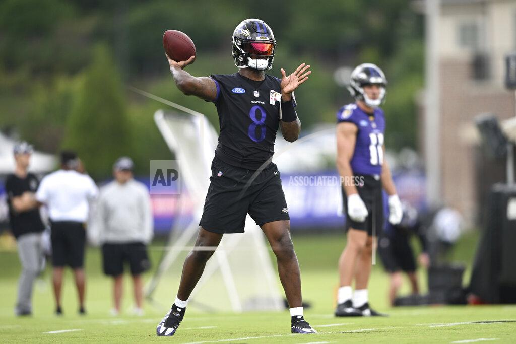 Gail Burton Baltimore Ravens quarterback Lamar Jackson takes part in drills at the NFL football team's training camp in Owings Mills, Md., Wednesday, July 27, 2022. (AP Photo/Gail Burton)