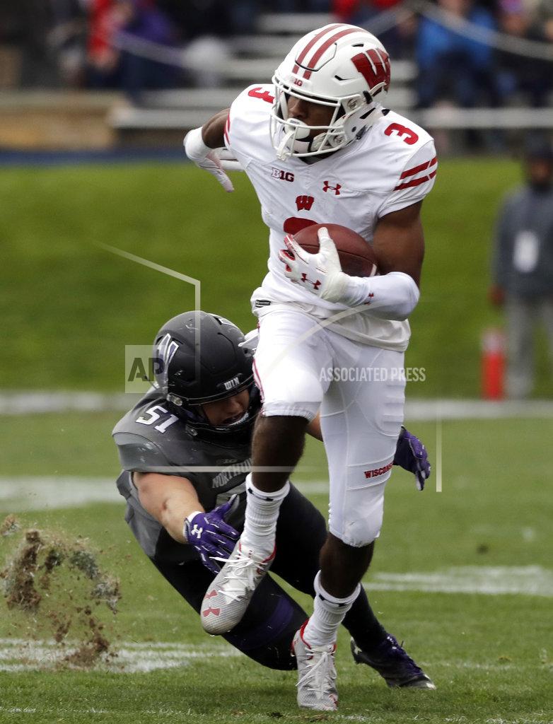 Nam Y. Huh Wisconsin wide receiver Kendric Pryor (3) runs with the ball past Northwestern linebacker Blake Gallagher during the second half of an NCAA college football game in Evanston, Ill., Saturday, Oct. 27, 2018. Northwestern won 31-17. (AP Photo/Nam Y. Huh)
