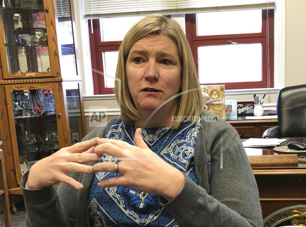 Daniel Sewell FILE—In this Dec. 19, 2019 file photo, Dayton mayor Nan Whaley talks in her office in Dayton, Ohio. Whaley announced Monday April 19, 2021, she will try to unseat Ohio's Republican governor after her effort to work with him on gun reforms in the aftermath of a mass shooting in her city stalled. (AP Photo/Daniel Sewell, File)