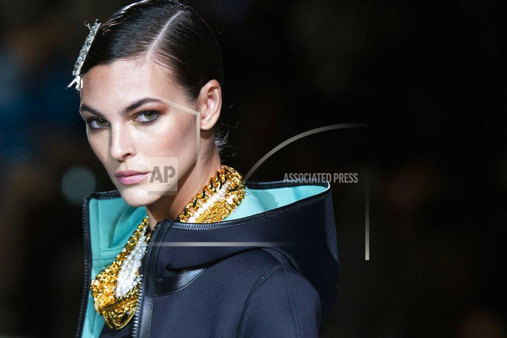 Eduardo Munoz Alvarez A model walks the runway at the Tom Ford spring/summer 2022 fashion show at Lincoln Center during New York Fashion Week on Sunday, Sept. 12, 2021. (AP Photo/Eduardo Munoz Alvarez)