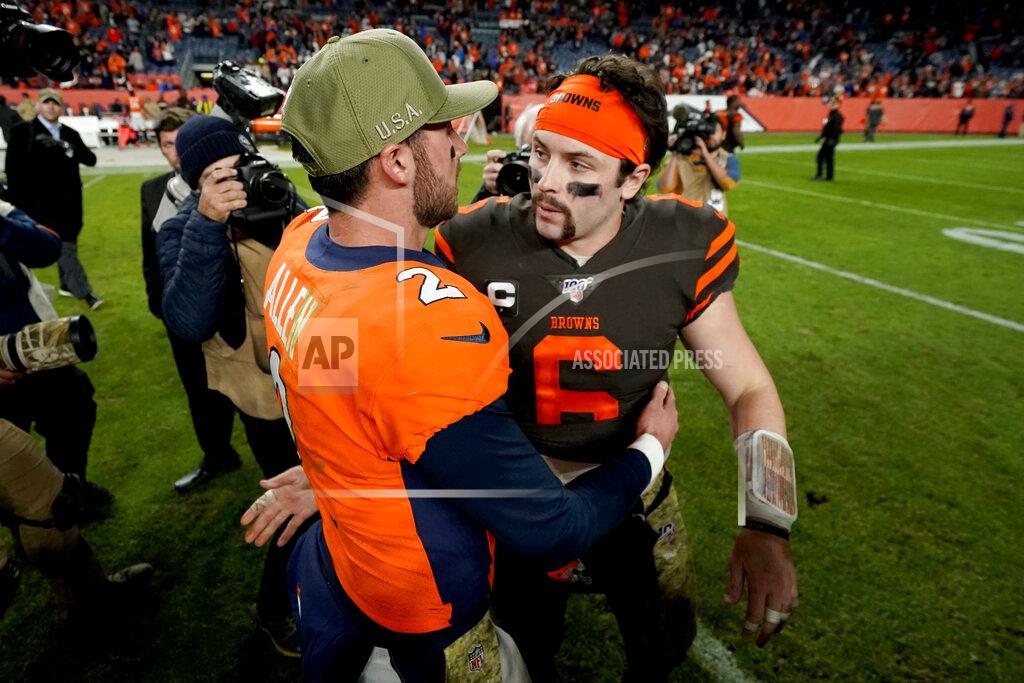 Jack Dempsey Denver Broncos quarterback Brandon Allen (2) greets Cleveland Browns quarterback Baker Mayfield (6) after an NFL football game, Sunday, Nov. 3, 2019, in Denver. The Broncos won 24-19. (AP Photo/Jack Dempsey)