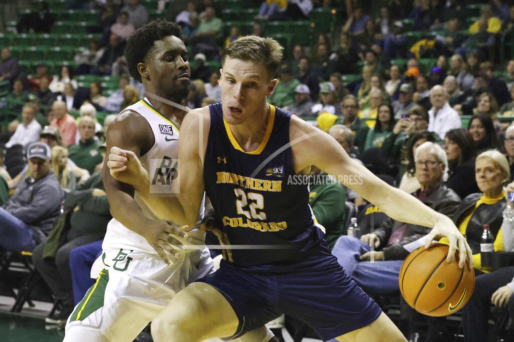 Rod Aydelotte Northern Colorado forward Riley Abercrombie (22) is guarded by Baylor guard Adam Flagler (10) while setting up an offensive play in the first half of an NCAA college basketball game, Monday, Nov. 14, 2022, in Waco, Texas. (AP Photo/Rod Aydelotte)