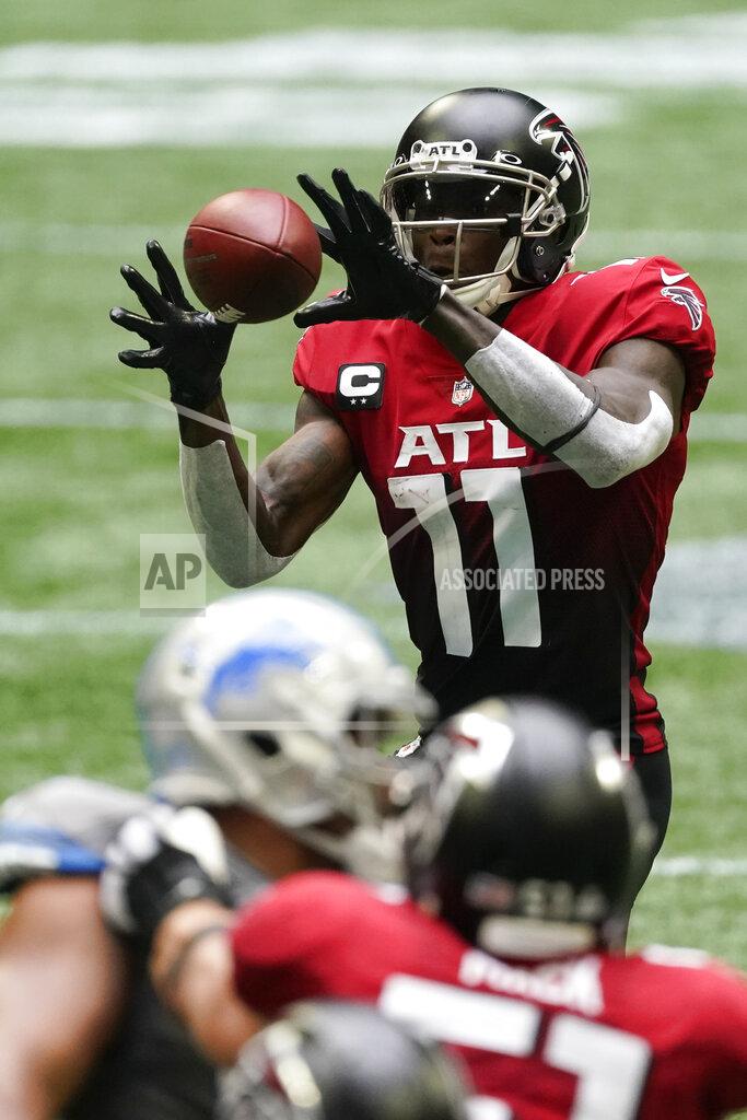 John Bazemore Atlanta Falcons wide receiver Julio Jones (11) makes the catch against the Detroit Lions during the second half of an NFL football game, Sunday, Oct. 25, 2020, in Atlanta. (AP Photo/John Bazemore)