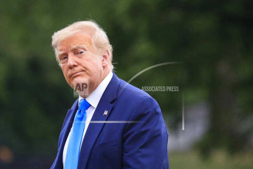 President Donald Trump walks across the South Lawn of the White House in Washington, Saturday, July 11, 2020. Trump was returning from a visit to nearby Walter Reed National Military Medical Center in Bethesda, Md. (AP Photo/Pablo Martinez Monsivais)