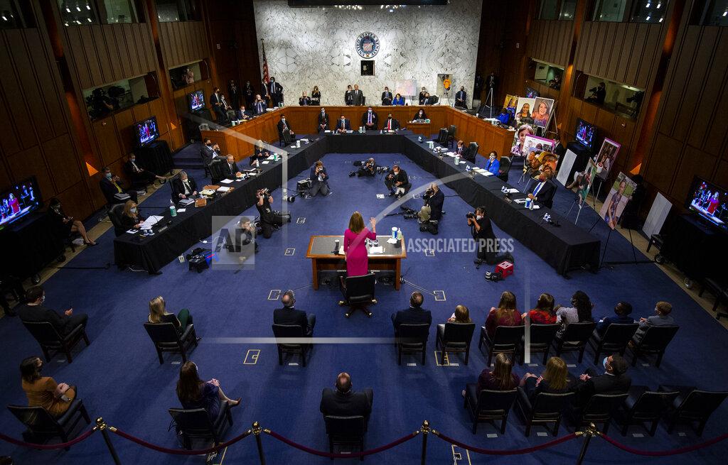 Supreme Court nominee Amy Coney Barrett is sworn in during a confirmation hearing before the Senate Judiciary Committee, Monday, Oct. 12, 2020, on Capitol Hill in Washington. (Kevin Dietsch/Pool via AP)