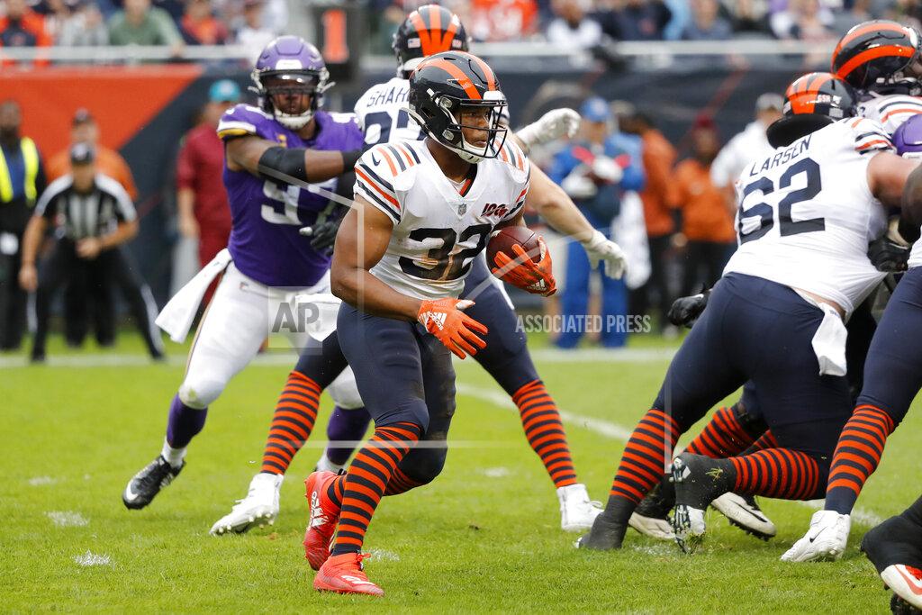 Charles Rex Arbogast Chicago Bears running back David Montgomery (32) runs with the ball during the half of an NFL football game against the Minnesota Vikings Sunday, Sept. 29, 2019, in Chicago. (AP Photo/Charles Rex Arbogast)