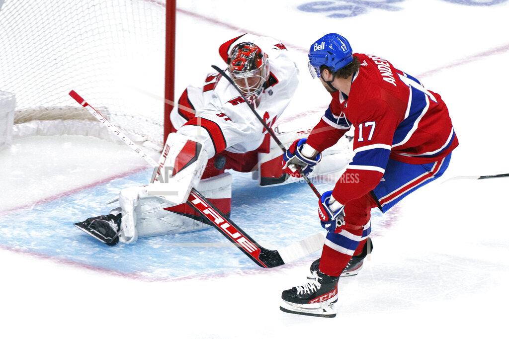 Paul Chiasson Carolina Hurricanes goaltender Frederik Andersen makes a save on Montreal Canadiens' Josh Anderson during the first period of an NHL hockey game Thursday, Oct. 21, 2021, in Montreal. (Paul Chiasson/The Canadian Press via AP)