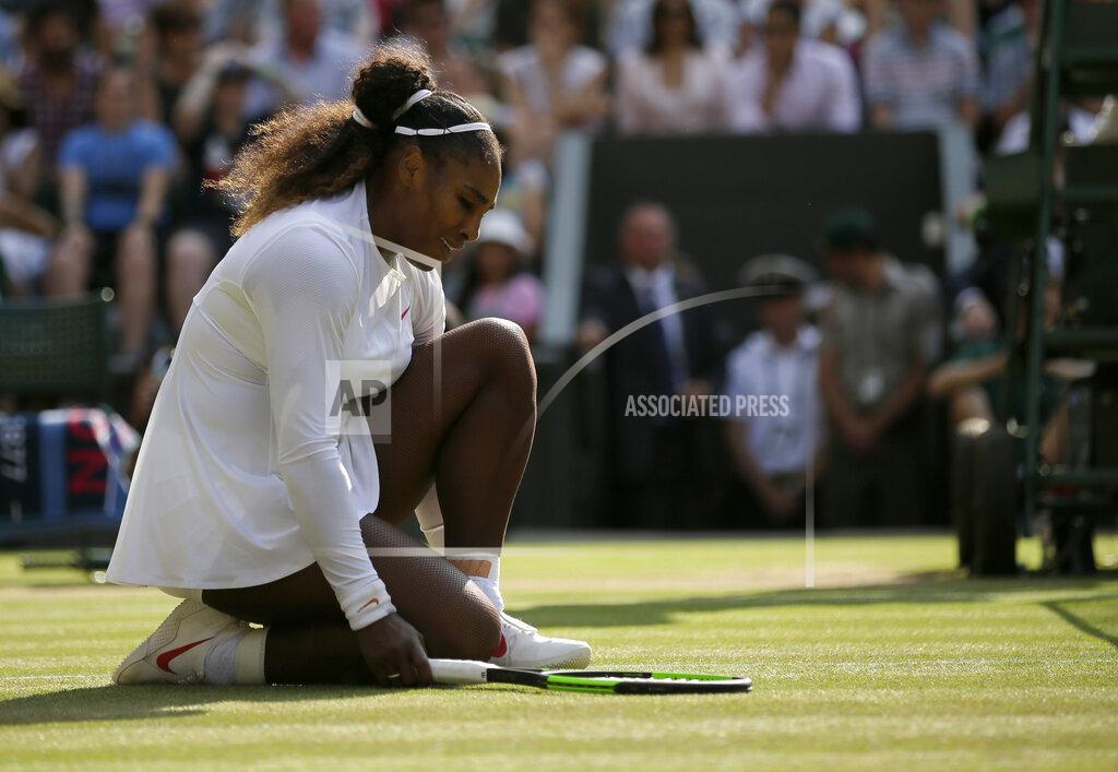 Tim Ireland FILE - Serena Williams kneels after losing a point to Germany's Angelique Kerber during their women's singles final match at the Wimbledon Tennis Championships, in London, Saturday July 14, 2018. The 2022 Wimbledon competition is not the first comeback from a significant absence for Williams. (AP Photo/Tim Ireland, File)