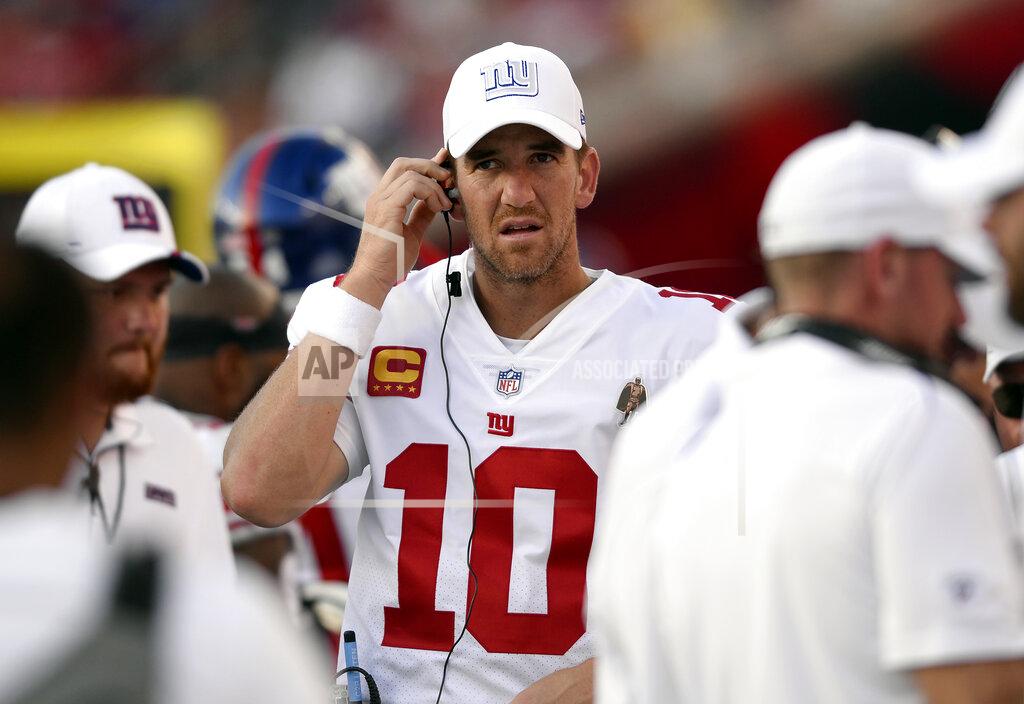 Jason Behnken New York Giants quarterback Eli Manning on the bench against the Tampa Bay Buccaneers during the second half of an NFL football game Sunday, Sept. 22, 2019, in Tampa, Fla. (AP Photo/Jason Behnken)