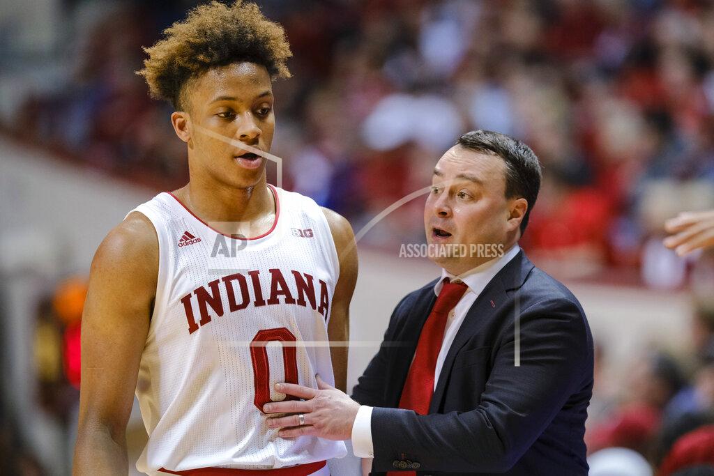 Aj Mast Indiana coach Archie Miller, right, talks with guard Romeo Langford during the first half of the team's NCAA college basketball game against Wisconsin in Bloomington, Ind., Tuesday, Feb. 26, 2019. Indiana won 75-73 in double overtime. (AP Photo/AJ Mast)