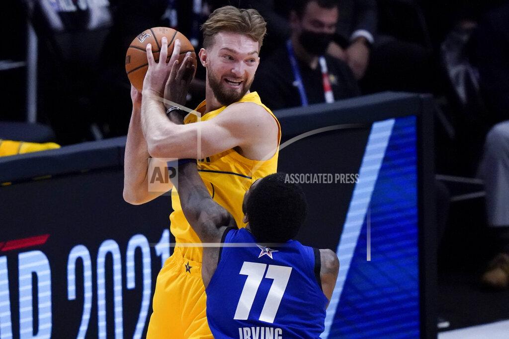 Brynn Anderson Brooklyn Nets guard Kyrie Irving guards Indiana Pacers forward Domantas Sabonis during the first half of basketball's NBA All-Star Game in Atlanta, Sunday, March 7, 2021. (AP Photo/Brynn Anderson)