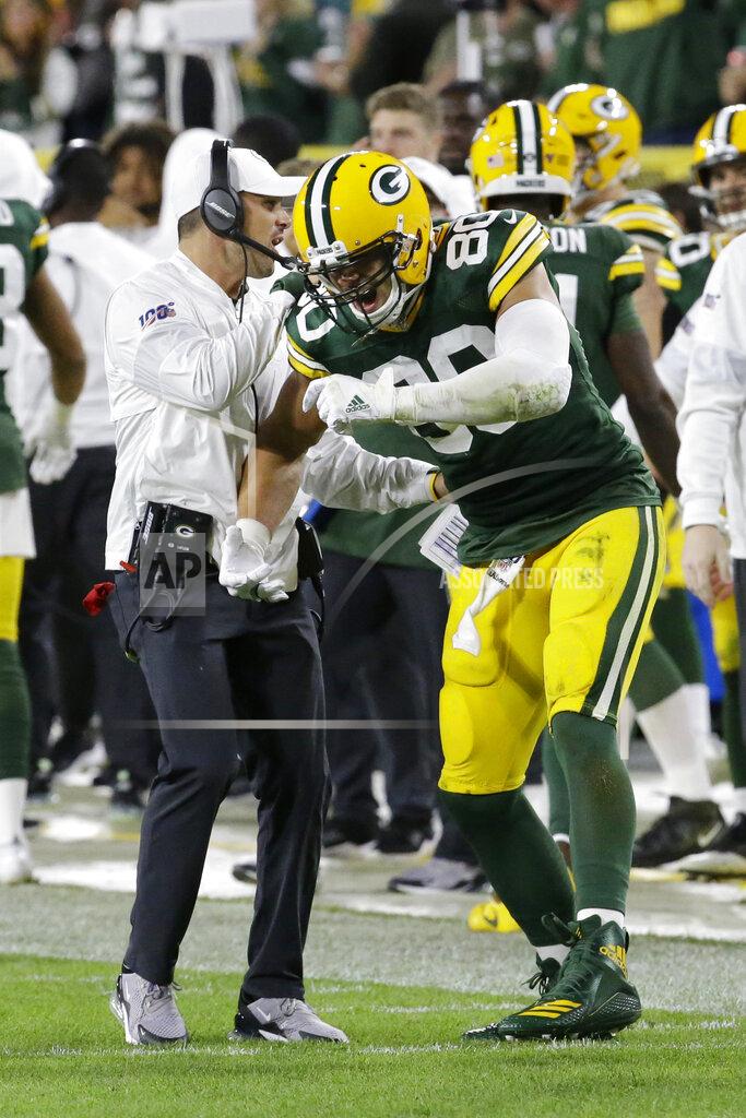 Mike Roemer Green Bay Packers tight end Jimmy Graham (80) and coach Matt LaFleur celebrate a Packers touchdown during the second half of the team's NFL football game against the Philadelphia Eagles on Thursday, Sept. 26, 2019, in Green Bay, Wis. (AP Photo/Mike Roemer)