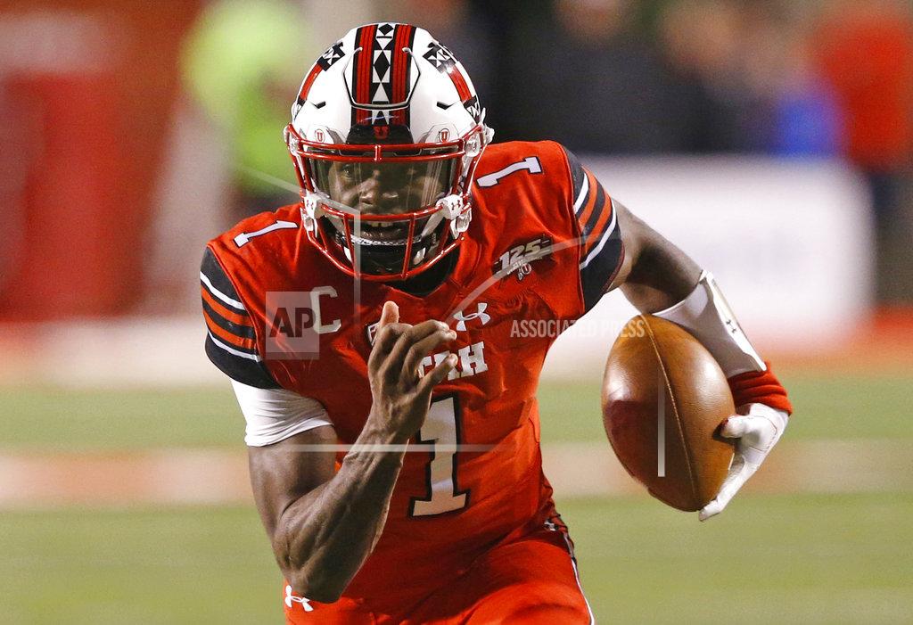 Rick Bowmer FILE - In this Oct. 12, 2018, file photo, Utah quarterback Tyler Huntley (1) carries the ball against Arizona during the first half of an NCAA college football game in Salt Lake City. The big question facing Utah when it hosts Oregon is whether Jason Shelley can pick up where Tyler Huntley left off. Shelley, a redshirt freshman, will make his first career start Saturday against the Ducks in place of Huntley, who broke his collarbone late in the third quarter of Utah's 38-20 loss last week to Arizona State. (AP Photo/Rick Bowmer, File)